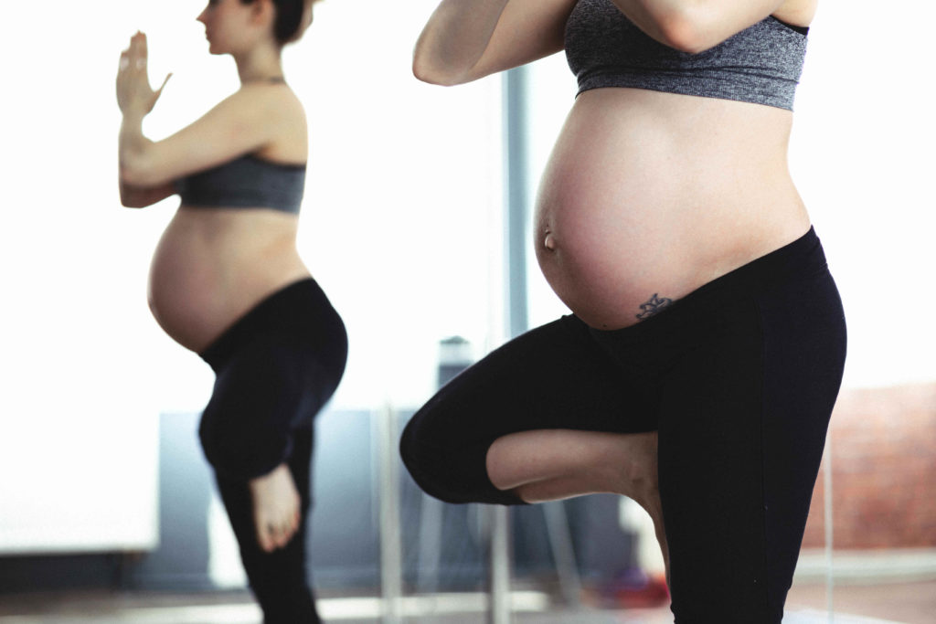 exercise during pregnancy - woman doing yoga