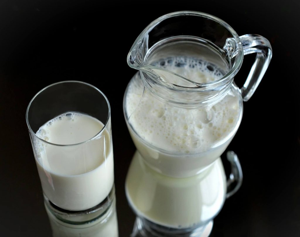 pregnancy diet plan - milk in a glass and pitcher